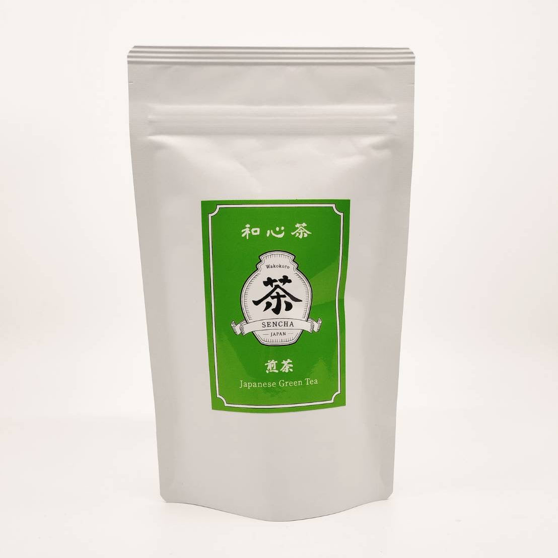 Tea package with green label on a white background
