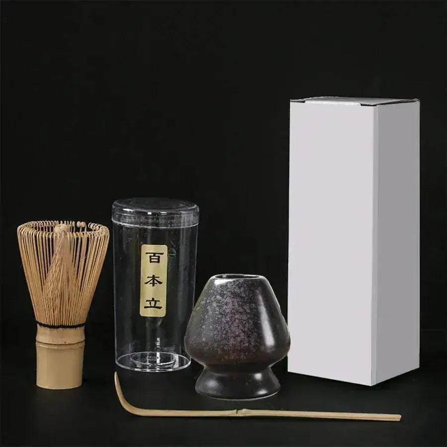 Japanese matcha tea set with bamboo whisk, ceramic bowl, and storage canister for authentic tea ceremony