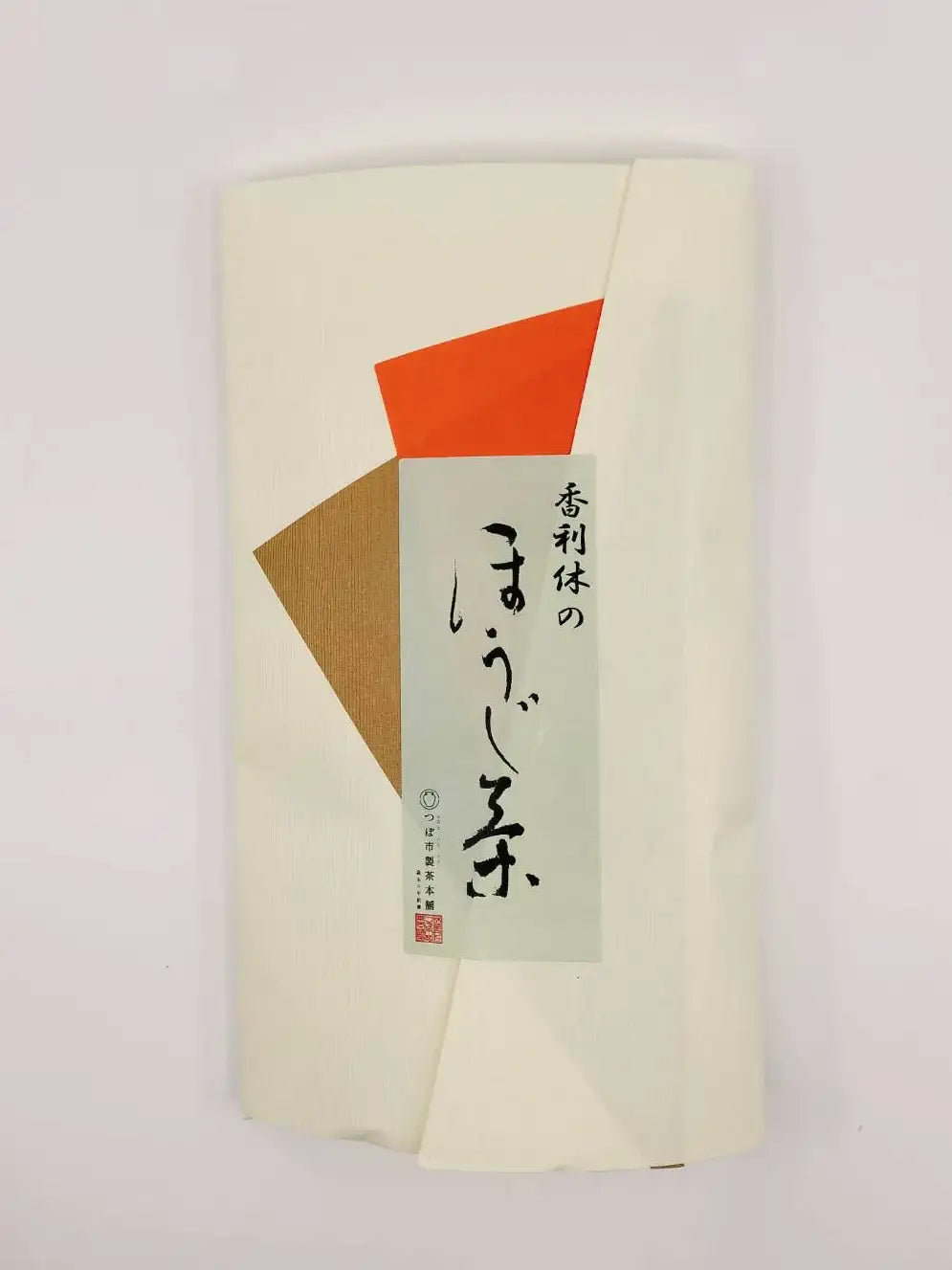 Folded paper with geometric shapes and Japanese text on a light gray background