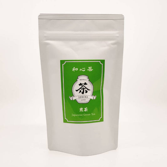 Tea package with green label on a white background