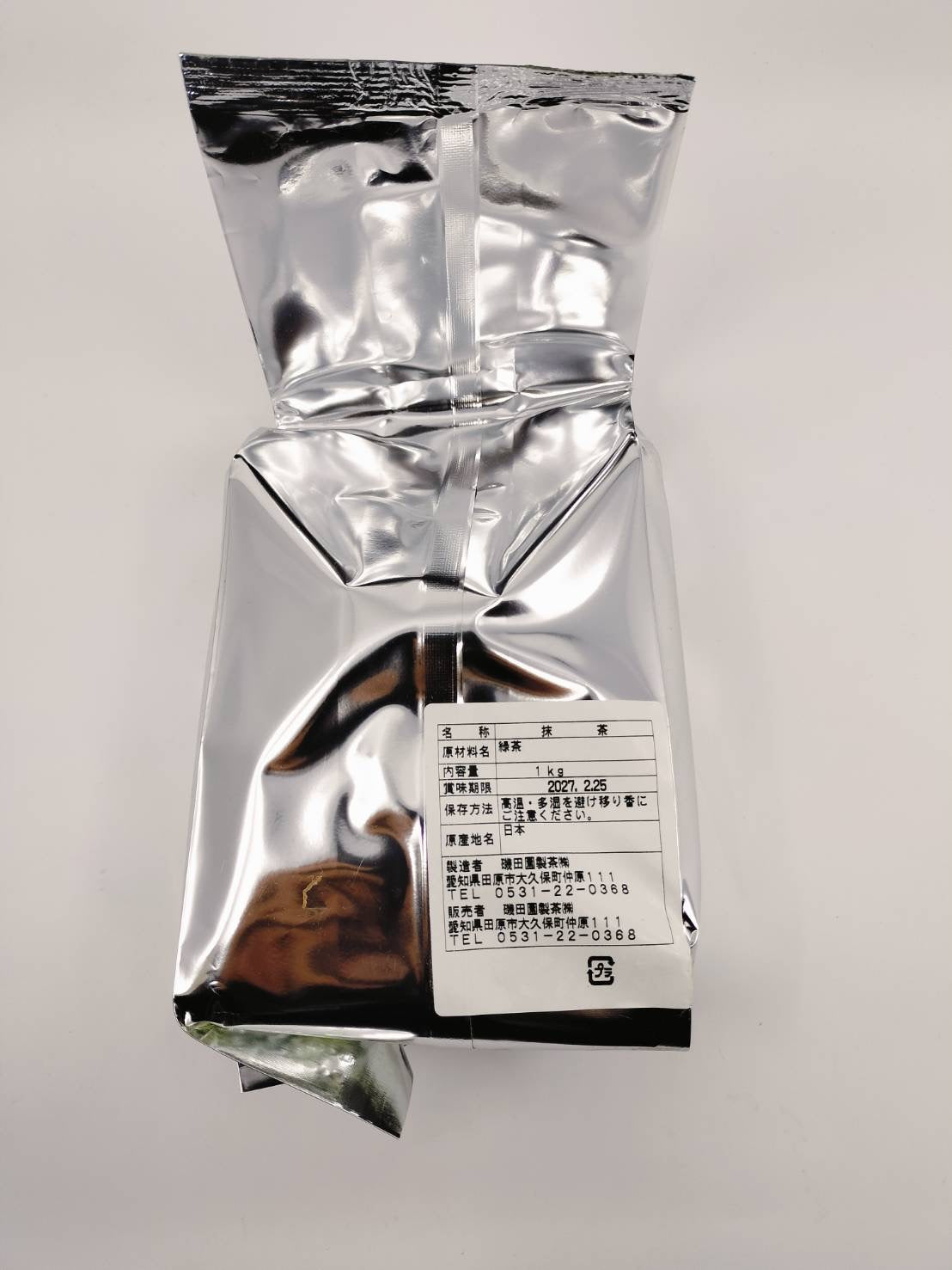 1kg Japanese matcha green tea in silver foil bag, labeled with origin and expiry date