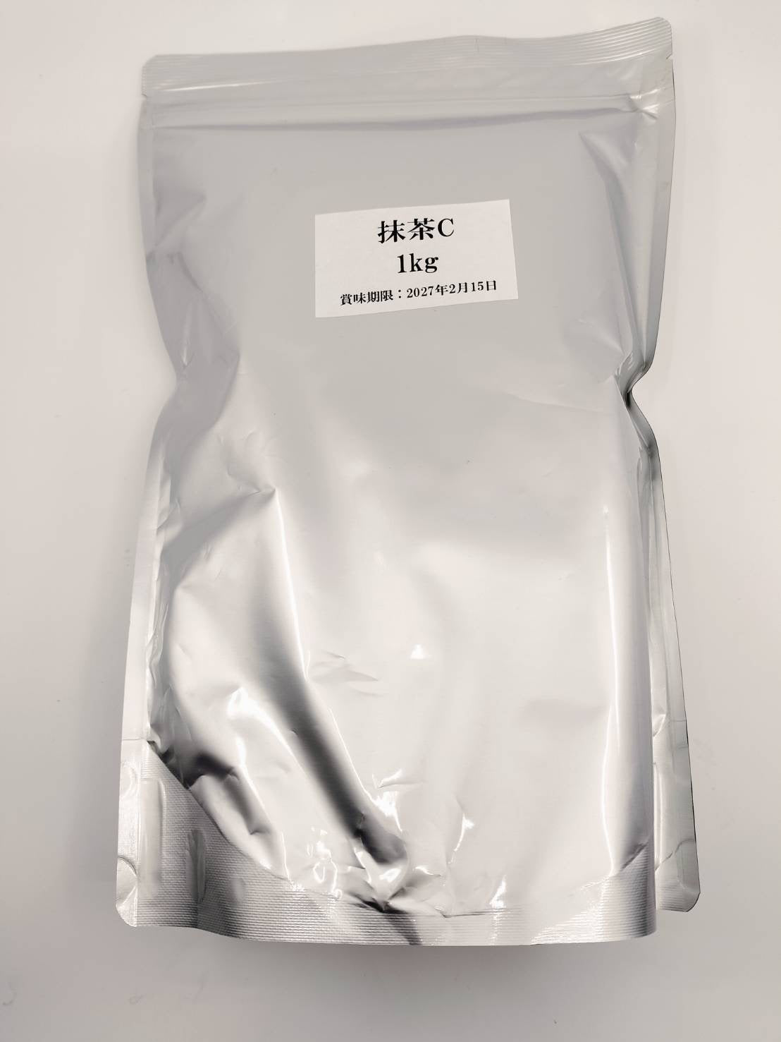 1kg bag of premium Japanese matcha tea powder, labeled Matcha C with best-by date